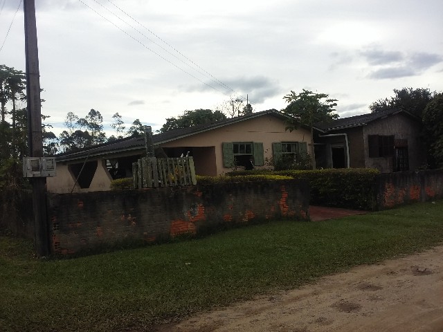 Foto 1 - Vendo terreno com duas casas